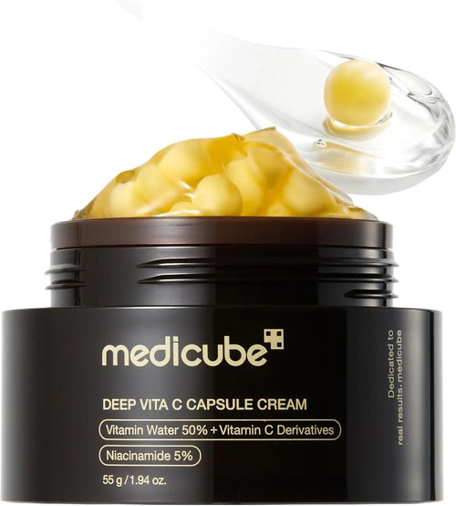 Crema viso Medicube Deep Vita C Capsule Cream, confezione con capsule di vitamina C per la cura della pelle.